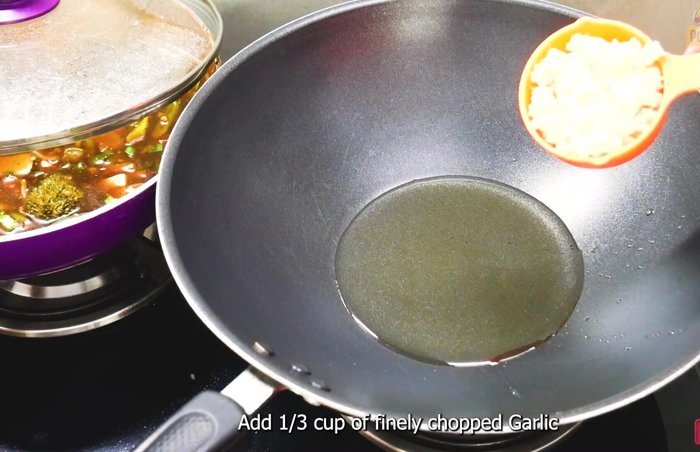 Heat oil in a separate pan. Add garlic and fry until light brown. (313.84)