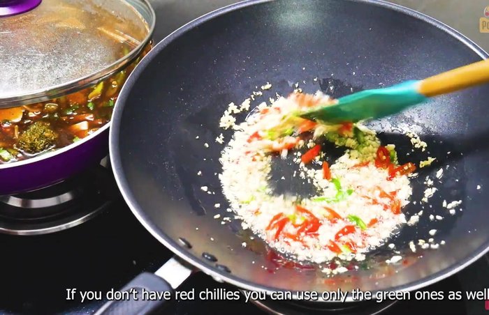 Add chopped chillies and coriander stalks. Fry until fragrant. (331.88)