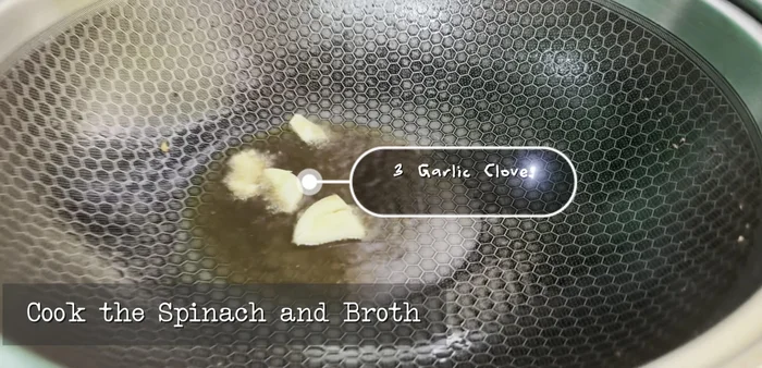 In the same wok, sauté garlic until fragrant.