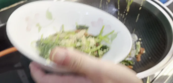 Transfer to a serving bowl and top with crispy anchovies.