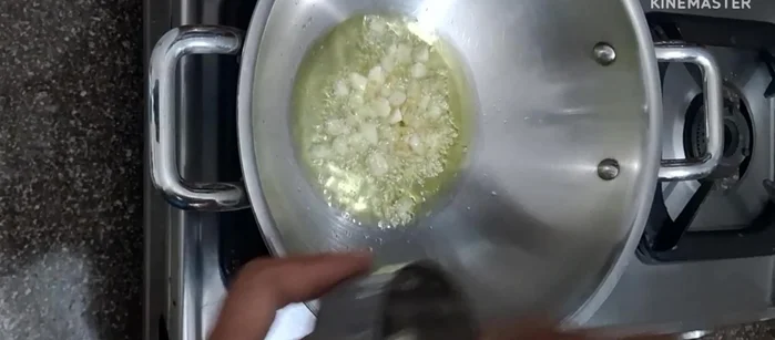 Add finely chopped ginger and garlic. Fry for a few seconds.