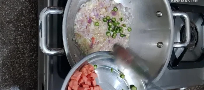 Add finely chopped capsicum, carrot, green chili, cabbage, boiled sweet corn, and peas. Cook on high flame until slightly softened.