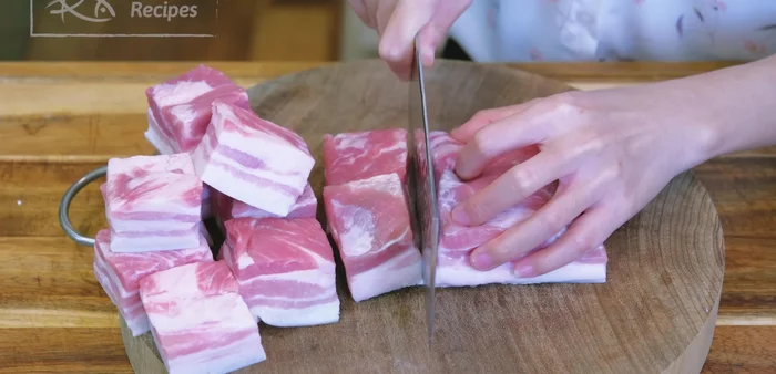 Cut the pork belly into 1 1/2 inch cubes.