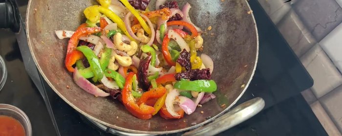 Add chili sauce, soy sauce, tomato sauce, salt, pepper, and water. Bring to a boil.