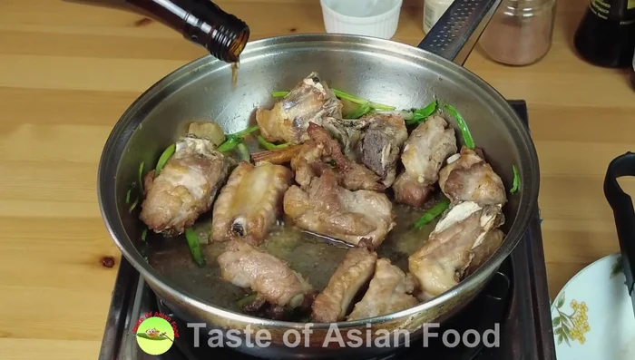 Add Chinese wine, vinegar, light soy sauce, Chinese five spice powder, white pepper, and rock sugar (156).
