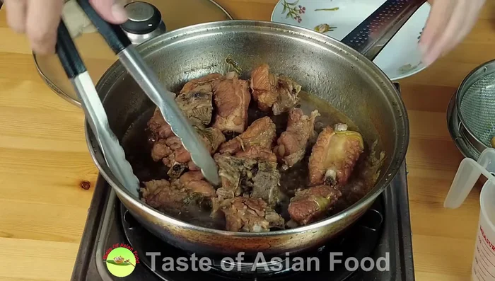 Return the pork ribs to the thickened gravy, coating each piece evenly (384.16).