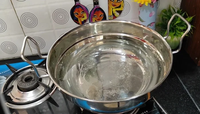 Boil noodles in salted water with 1 tablespoon of oil until 80% cooked (about 5 minutes). Drain and toss with 1 tablespoon of oil to prevent sticking.