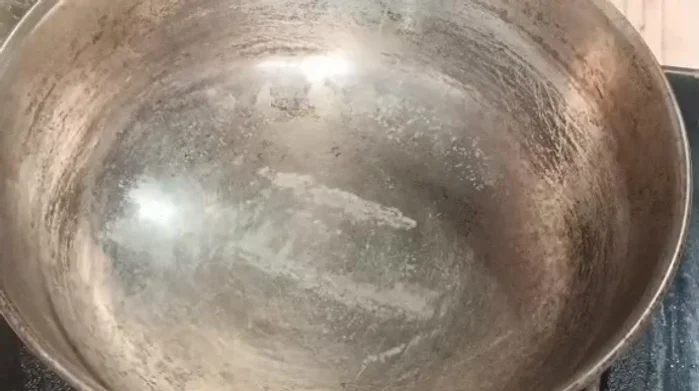 Cook the skin mixture in a pan over medium heat, stirring continuously until thickened.
