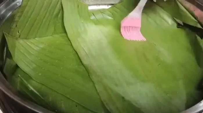 Steam the coipan on banana leaves in a steamer for 5-10 minutes.