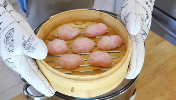 Steam dumplings in a large steamer over high heat for about 1 minute.