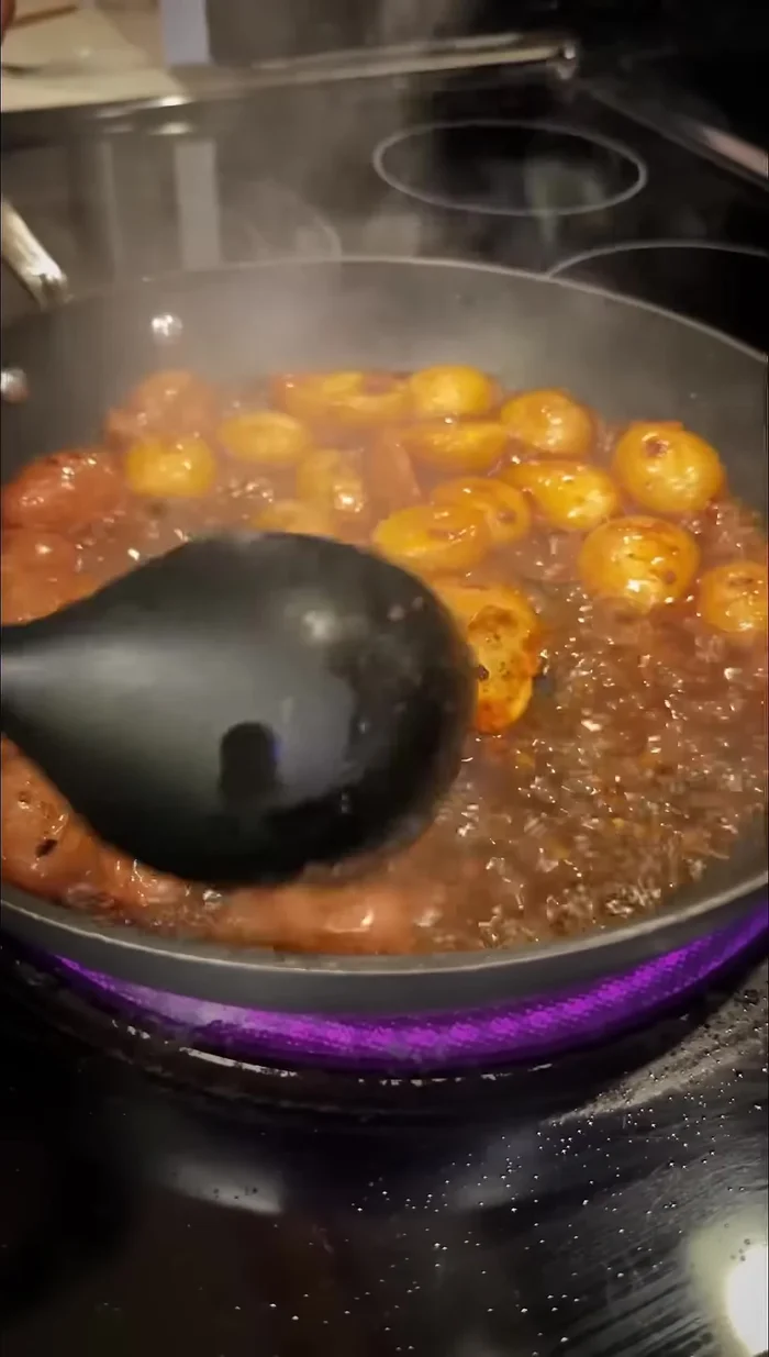 Pour sauce over the fried potatoes and toss to coat.