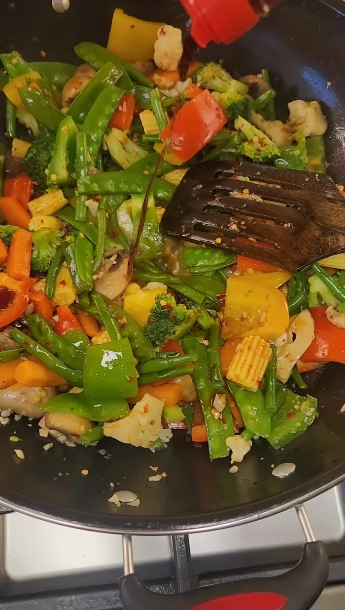 Add soy sauce, light soy sauce, dark soy sauce, and garlic chili sauce. (Adjust sauces to your taste.)