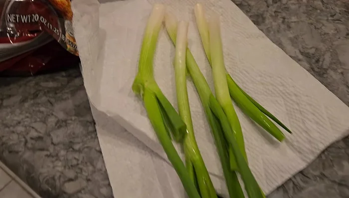 Prepare ingredients: Chop scallions, mince garlic and ginger.