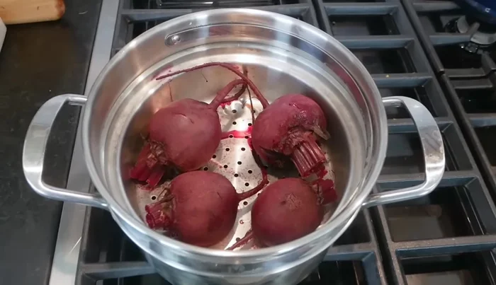 Turn off the heat and let the beets sit in the pot for about 5 minutes to cool.
