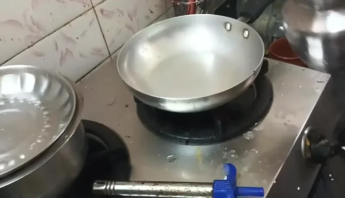 Boil water in a pan.