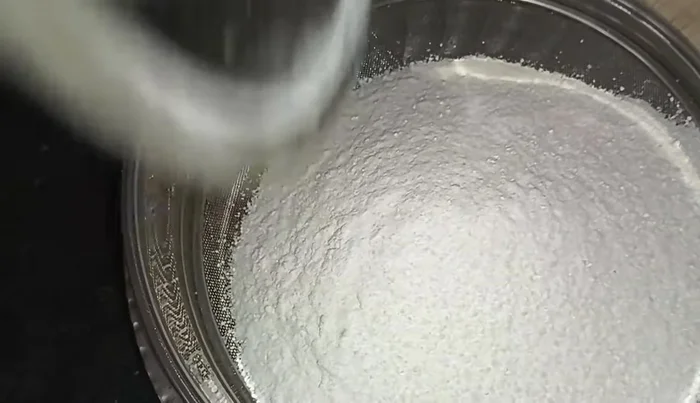 Sift the chapati flour through a sieve to remove any lumps.