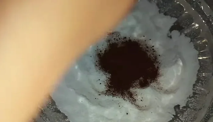 Mix coffee powder (1 full pack + 1-2 tbsp), cane sugar (1-2 tbsp) in a bowl.