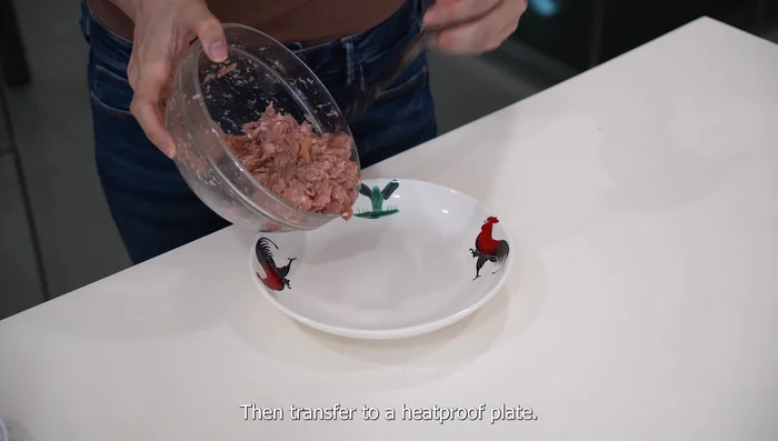 Transfer the mixture to a heatproof plate and spread it out thinly.