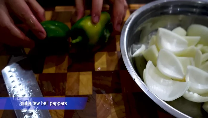 Chop onions for the base of the baking tray.
