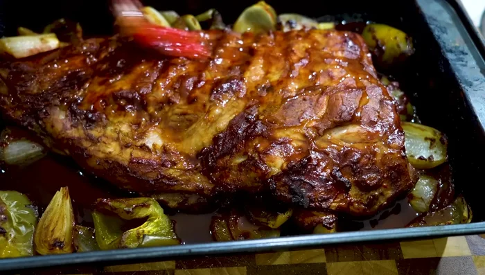 Drizzle honey over the ribs and bake for another 5 minutes per side.