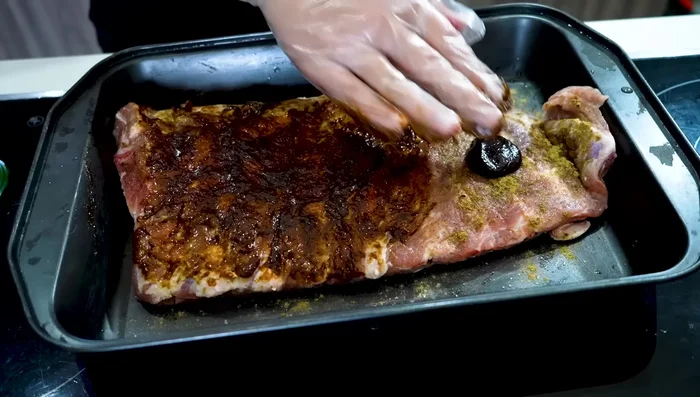 Massage the seasoning into the ribs for 1-2 minutes on each side.