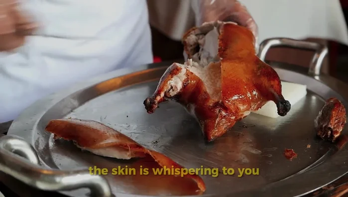 Let the duck rest for at least 15 minutes before carving. (455.599)