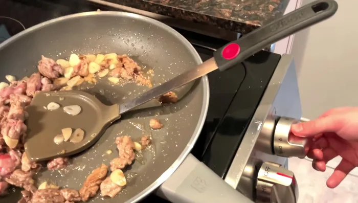 Once the lamb is mostly cooked, turn off the heat.