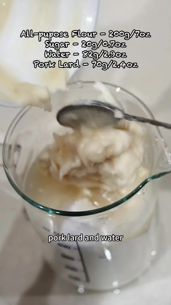 Prepare water dough: Mix all-purpose flour, sugar, pork lard, and water using a hand mixer. Cover and let rest for 30 minutes.
