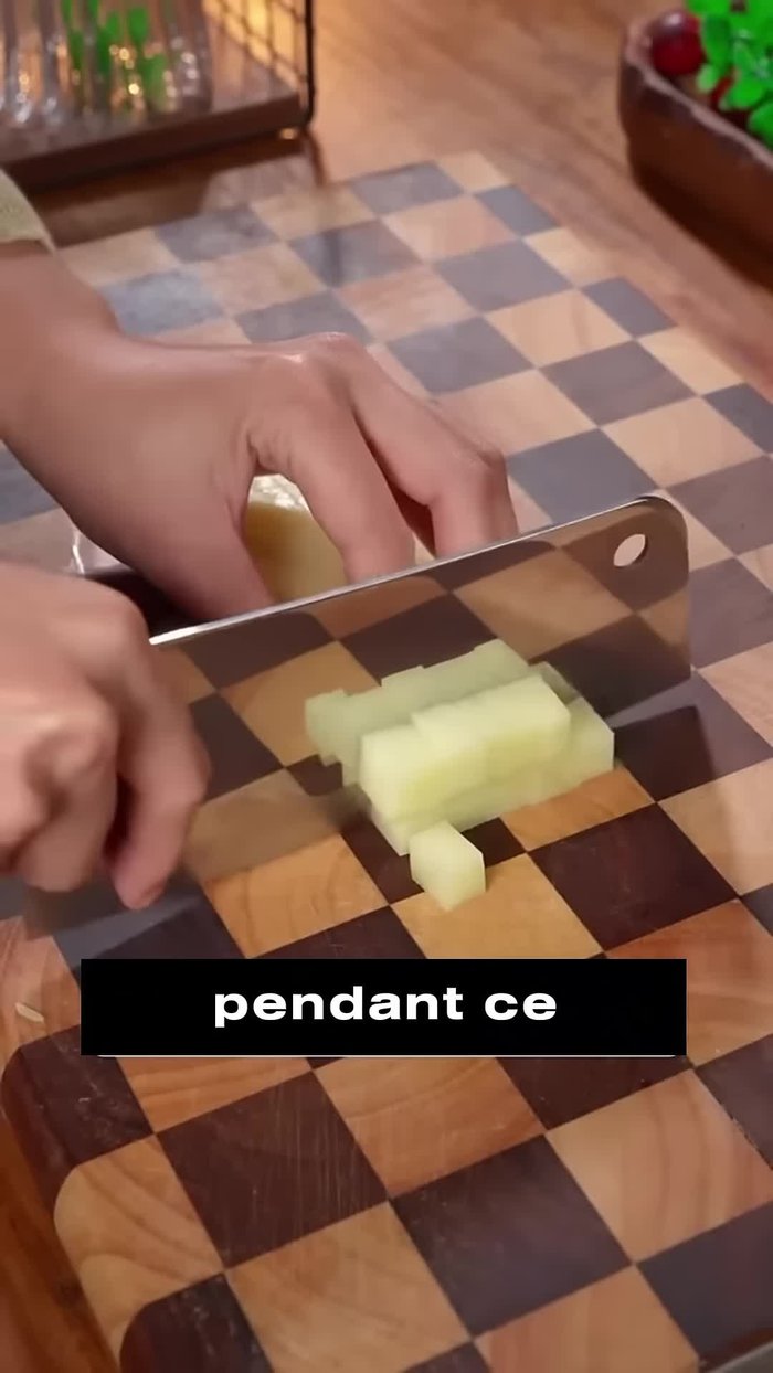 Cut potatoes and carrots into small cubes.