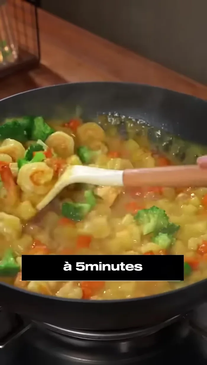 Add broccoli and stir quickly to keep it crisp.