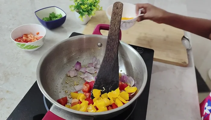 Add the chopped capsicums.
