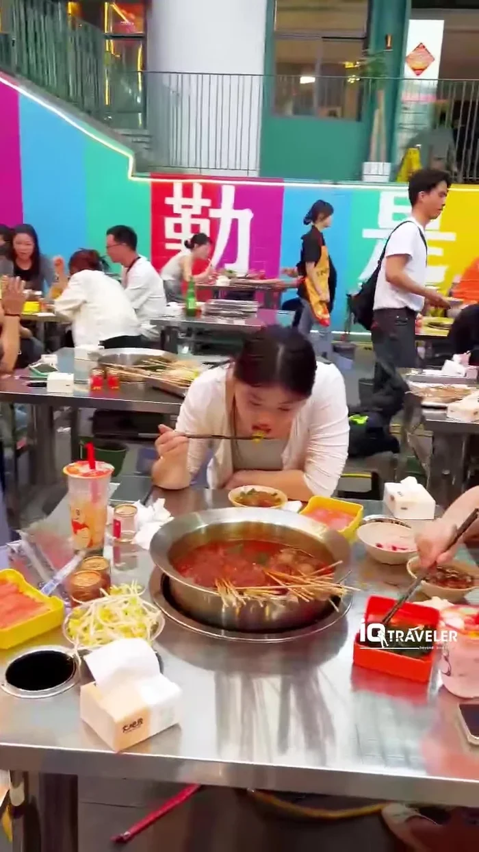 Add your chosen broth to the hot pot.
