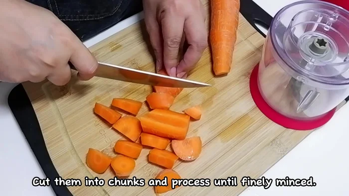 Roughly chop carrots and red onions. Process them in a food processor until finely chopped.