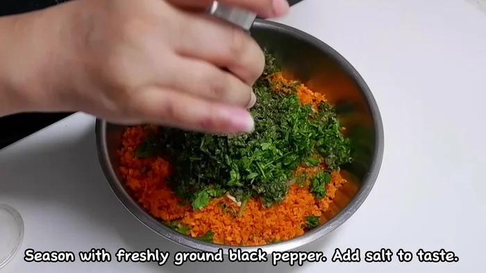 In a bowl, combine the processed vegetables with ground pork, black pepper, salt, and eggs.