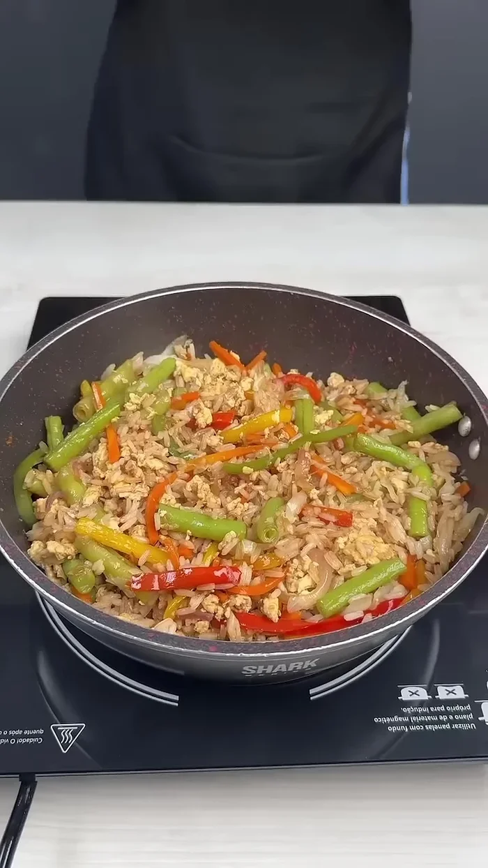 Add the fried chicken to the pan.