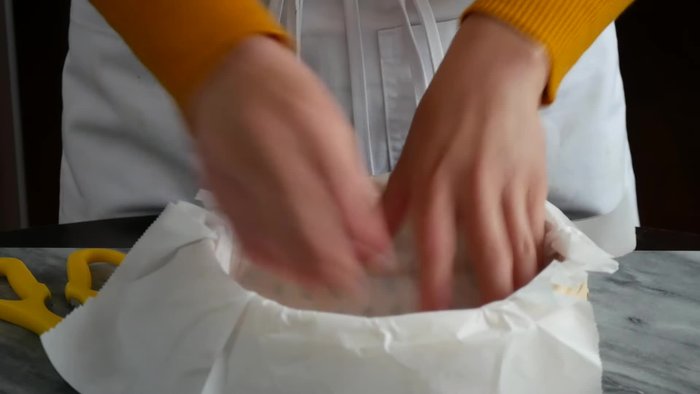 Prepare the steamer: Use an 8-inch bamboo steamer or an 8-inch round cake pan (butter the pan if using). Line the bottom of the pan with parchment paper.
