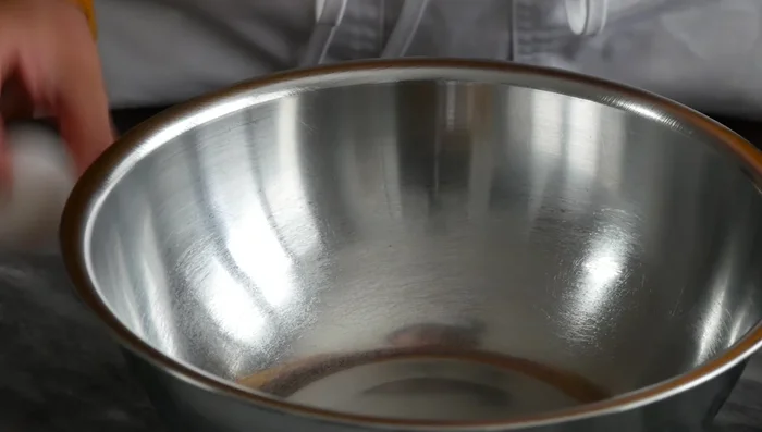 Whisk together eggs, sugar, evaporated milk, oil, and vanilla extract. Add yeast and let it sit for 1.5-2 hours until foamy.