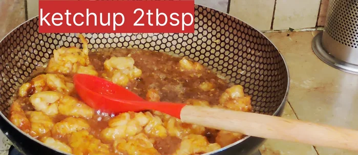 Combine and finish: Add the fried chicken to the gravy. Stir to coat. Add honey and sesame seeds. Adjust seasoning with salt if needed.