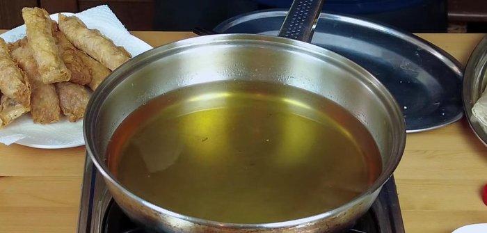 Heat oil to 170-180°C (590.279). Deep fry the shrimp rolls until golden brown (611.2).