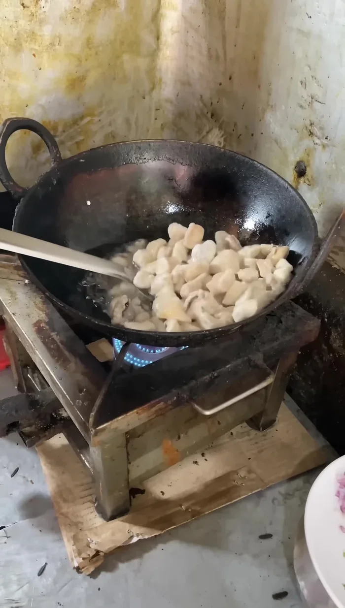 Heat oil in a pan. Add garlic cloves and fry for some time.