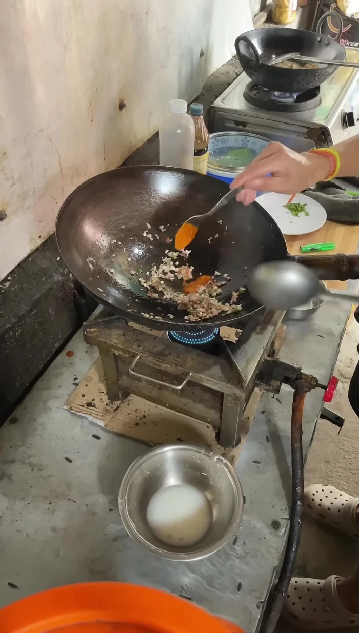 Add tomato sauce, 1 cup of water, salt, and a little sugar.