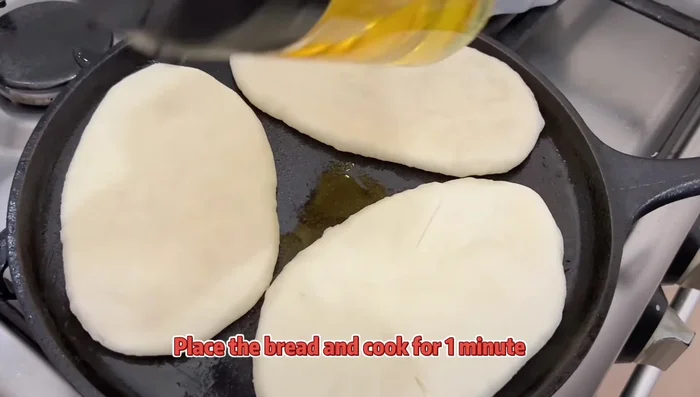 Cook the bread: Spray oil in a flat pan. Cook each bread for 1 minute per side.