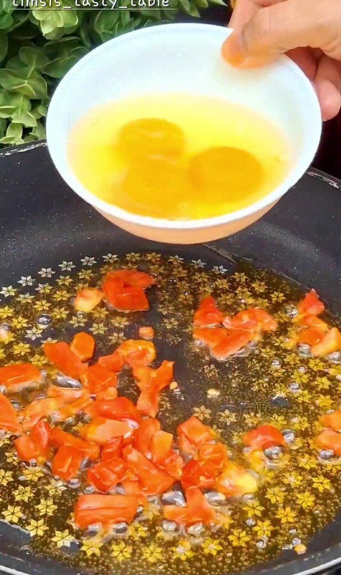 Add 3 eggs (or 2, as per preference). Break lightly and scramble.