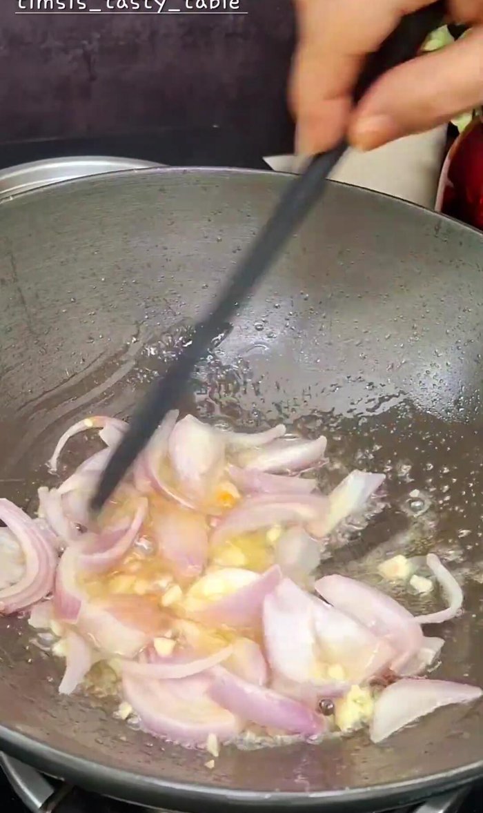Add thinly sliced onions and saute until slightly translucent.