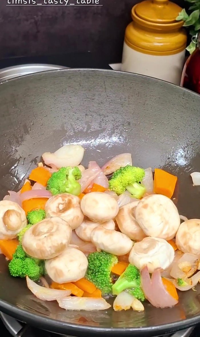 Add mushrooms (whole or chopped). Stir-fry.