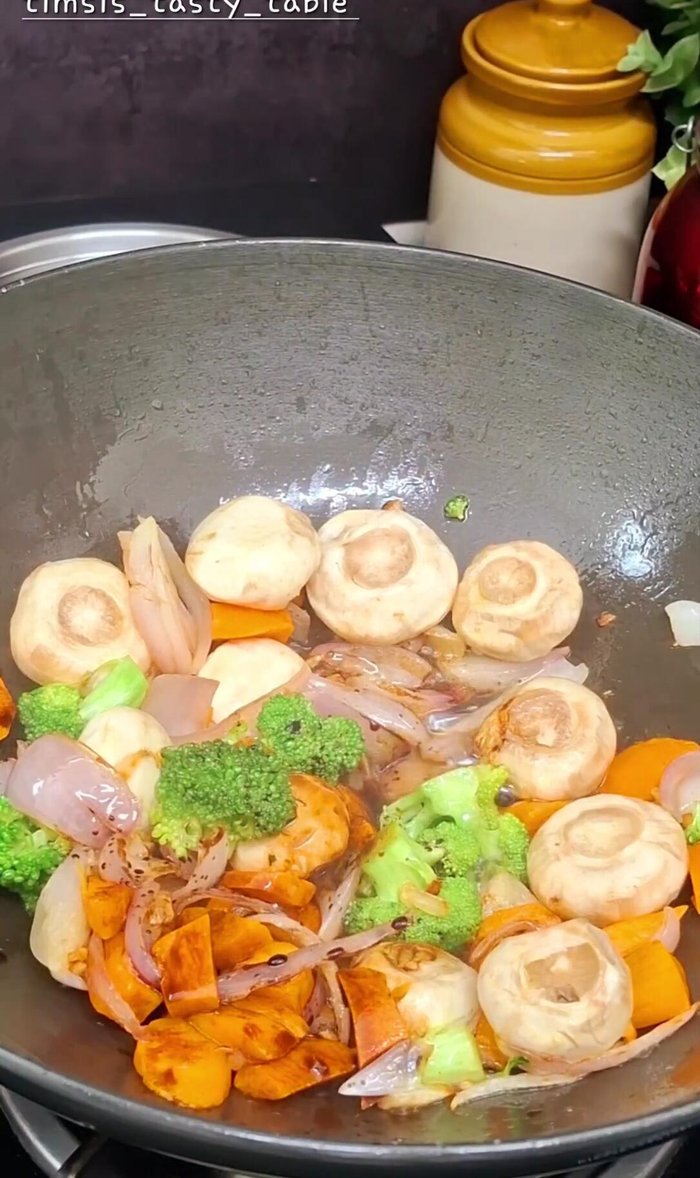 Add soy sauce, salt, and black pepper powder. Mix well.