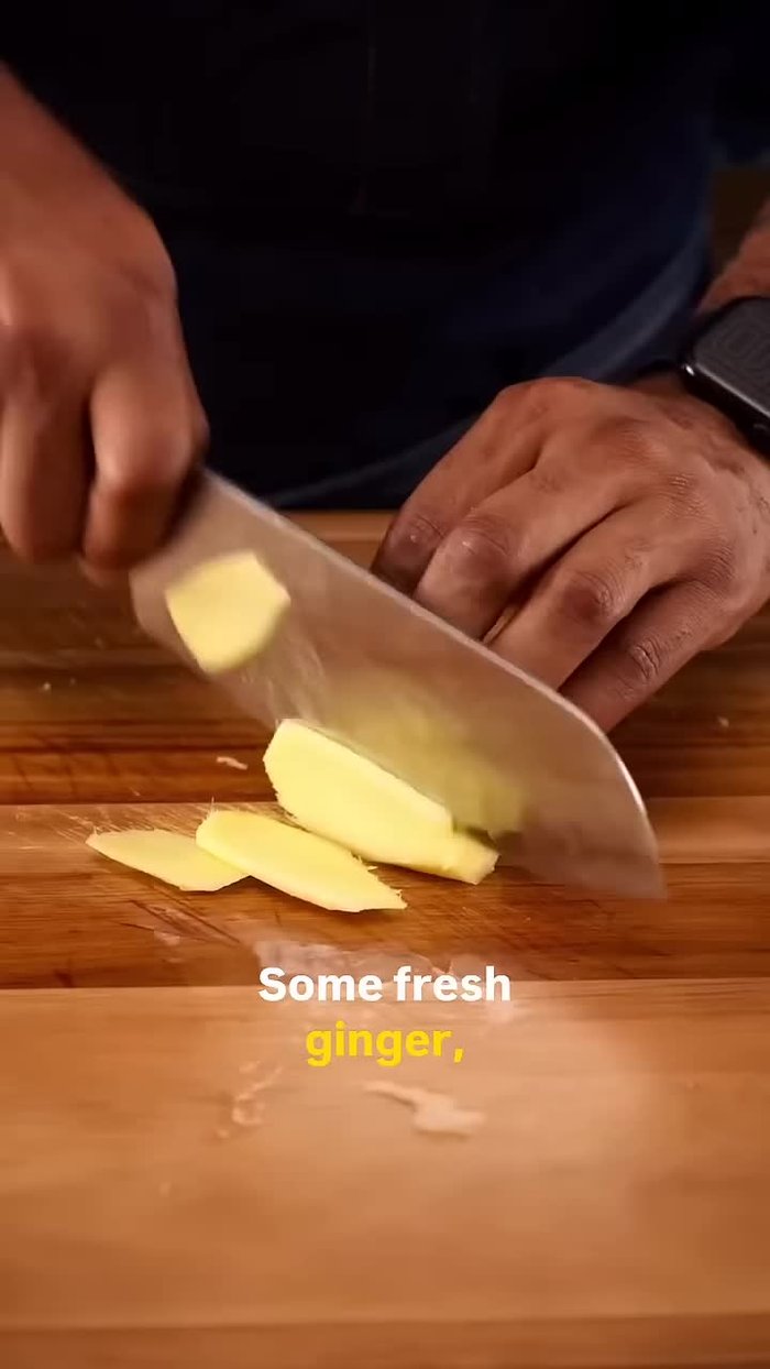 Prepare fresh ginger, garlic, and dice a ripe mango.
