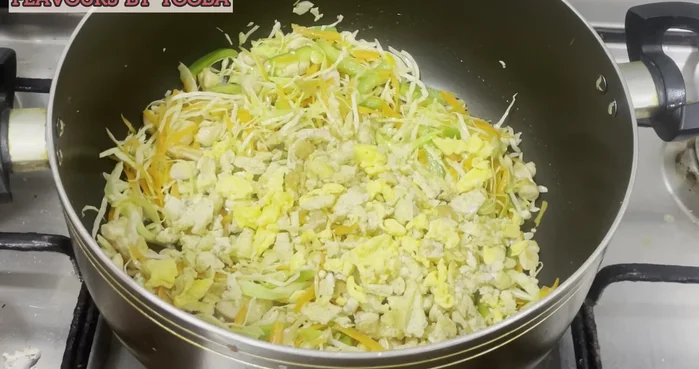 Add scrambled eggs and spring onions. (294.24)