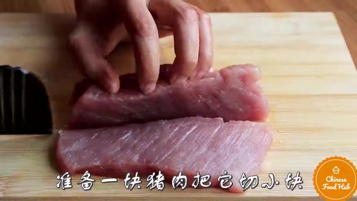 Prepare the wonton filling by combining ground pork, shrimp, finely chopped scallions, grated ginger, soy sauce, and sesame oil in a mixing bowl. Mix well.