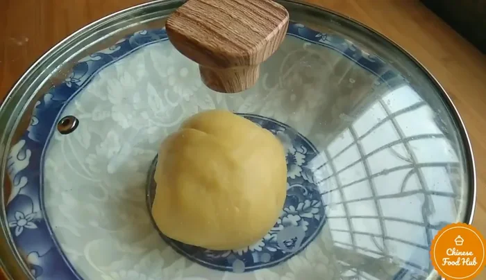 Shape the dough into buns.